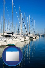 colorado map icon and sailboats in a marina