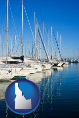 idaho map icon and sailboats in a marina
