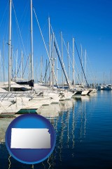kansas map icon and sailboats in a marina