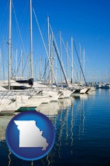 missouri map icon and sailboats in a marina