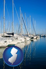 new-jersey map icon and sailboats in a marina