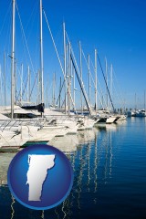vermont map icon and sailboats in a marina