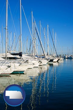 sailboats in a marina - with Nebraska icon