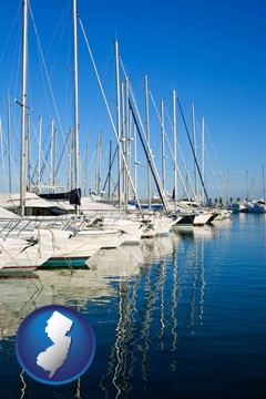 sailboats in a marina - with New Jersey icon