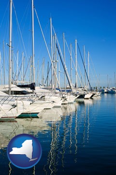 sailboats in a marina - with New York icon