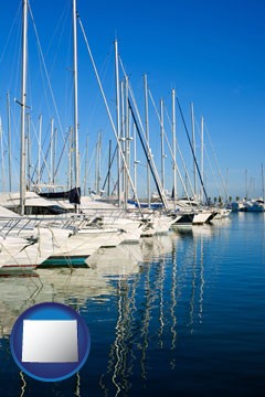sailboats in a marina - with Wyoming icon